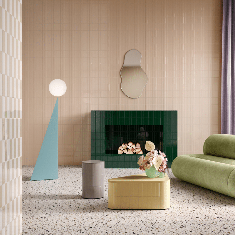 un salon design avec une cheminée verte en carrelage Quintessenza Färgblock
